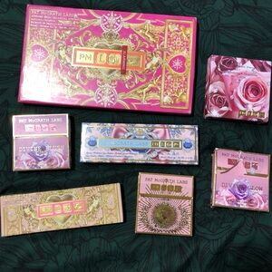Pat McGrath Eye Shadow Palette with Gold and Pink Design